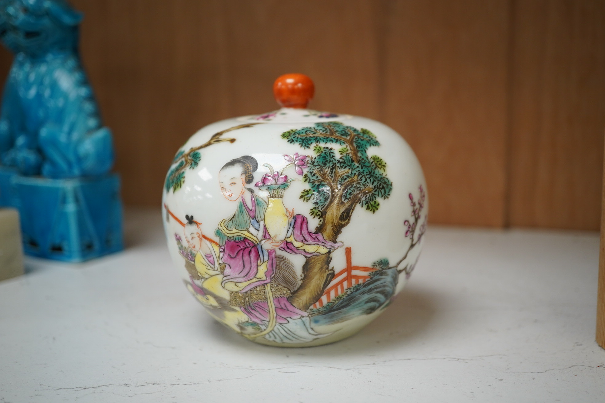 A famille rose bullet shape jar and cover, 10cm high. Condition - fair to good